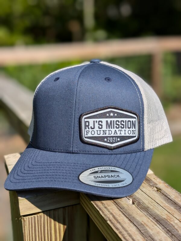 RJ’s Mission Emblem Trucker Hat - Image 6